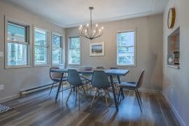 Brand new dining room and table with bright windows. Newly renovated home with brand new kitchen appliances, open concept living. Right on the skiway to access the village and chairlifts. Walking distance to the village. Private hot tub, laundry, ski/gear room, BBQ and more!