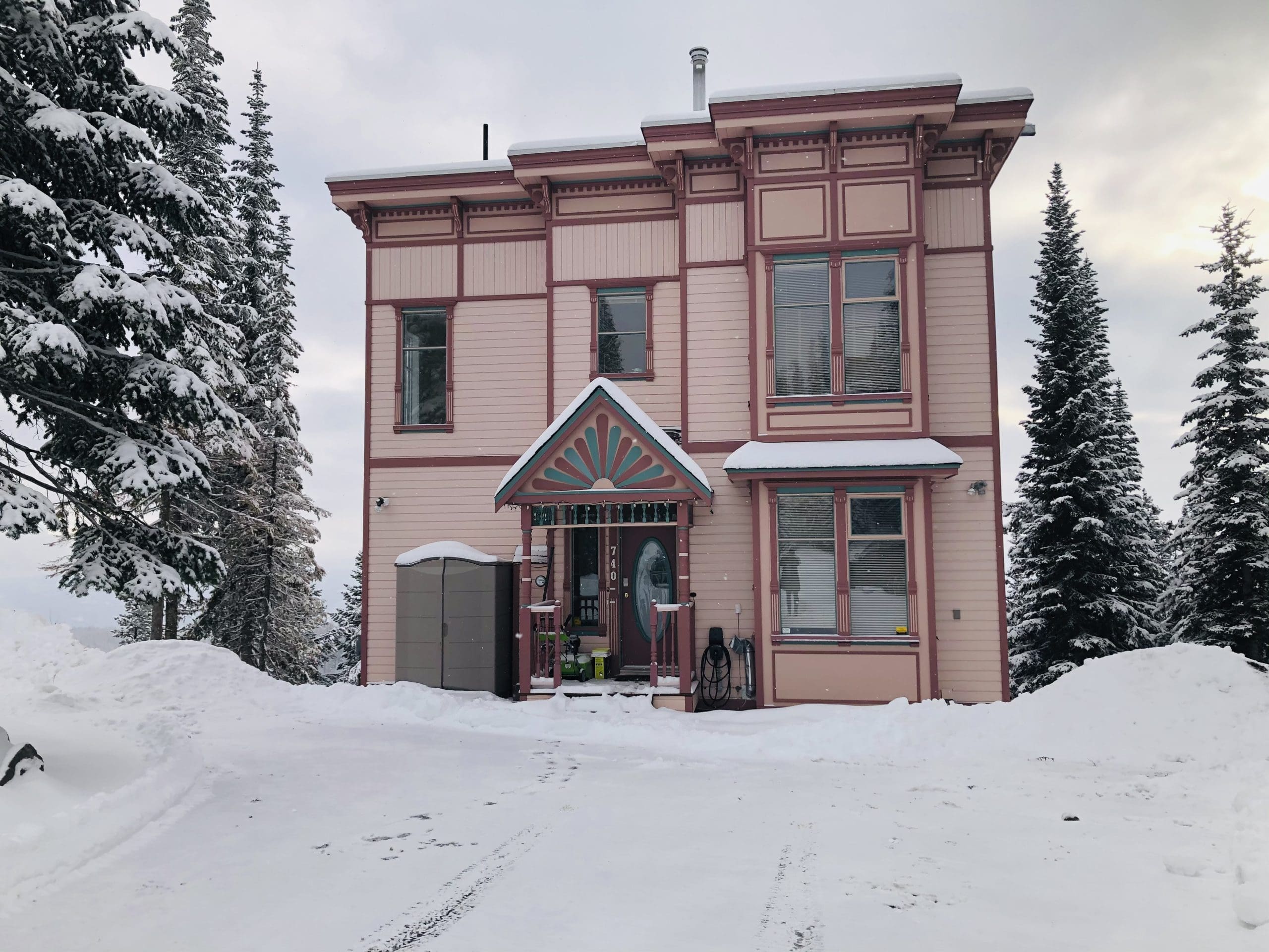 Exterior of Skyline Home. Backs right onto the skiway with incredible views of the mountains. Private hot tub, laundry, BBQ on large deck, private den and lower level suite for family and friends.