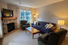 Cozy corner condo on second floor but ground level access and balcony with private BBQ. Gas fireplace, TV, and enough space for family or small group or friends.