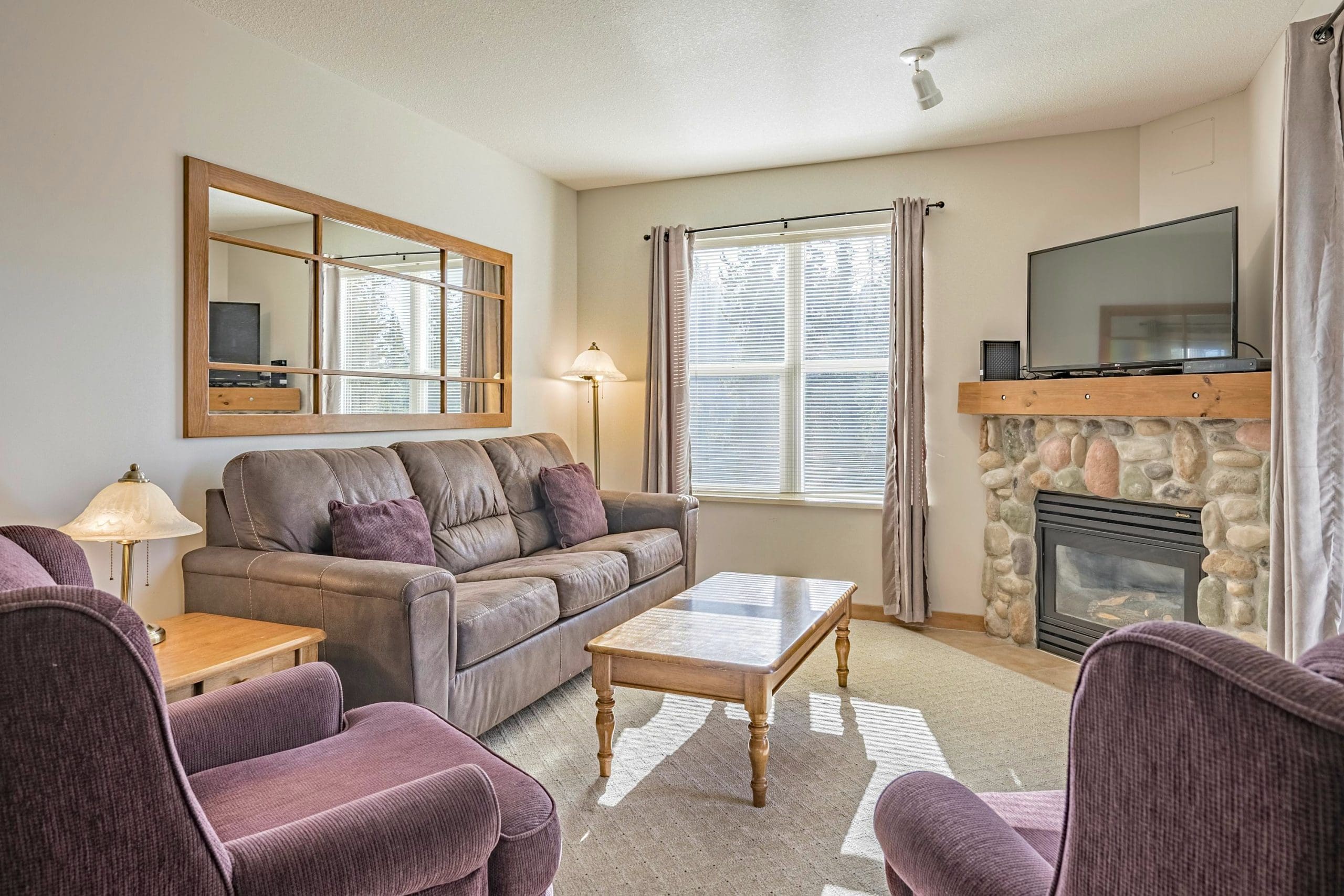 Cozy corner 3rd floor condo with bright large windows, deck with BBQ, gas fireplace, TV. This building is at the base of the Silver Queen Chair, walk down the stairs to the ski locker and you're on the skiway.