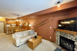 Cozy ground floor condo right at the base of the Silver Queen Chair. Ski out from your door to the lift. Gas fireplace, TV, free parking in this Creekside condo .