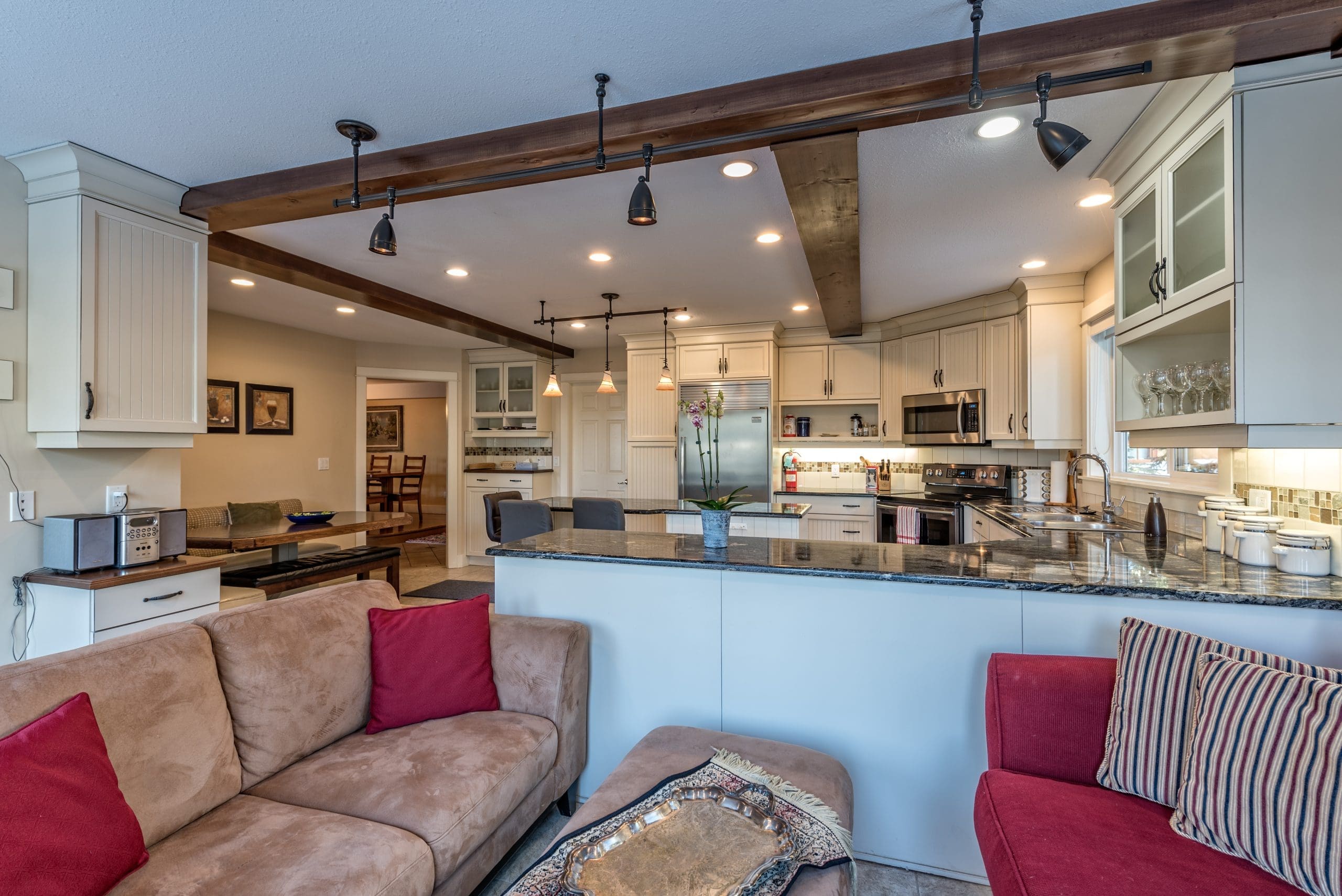 This extra large home has enough space for everyone. Incredible decor and care taken into this home. Large sitting area, dining table and fully-stocked kitchen. Features a private hot tub, laundry, sauna, gym in garage, garage for storage, and it's even pet-friendly!