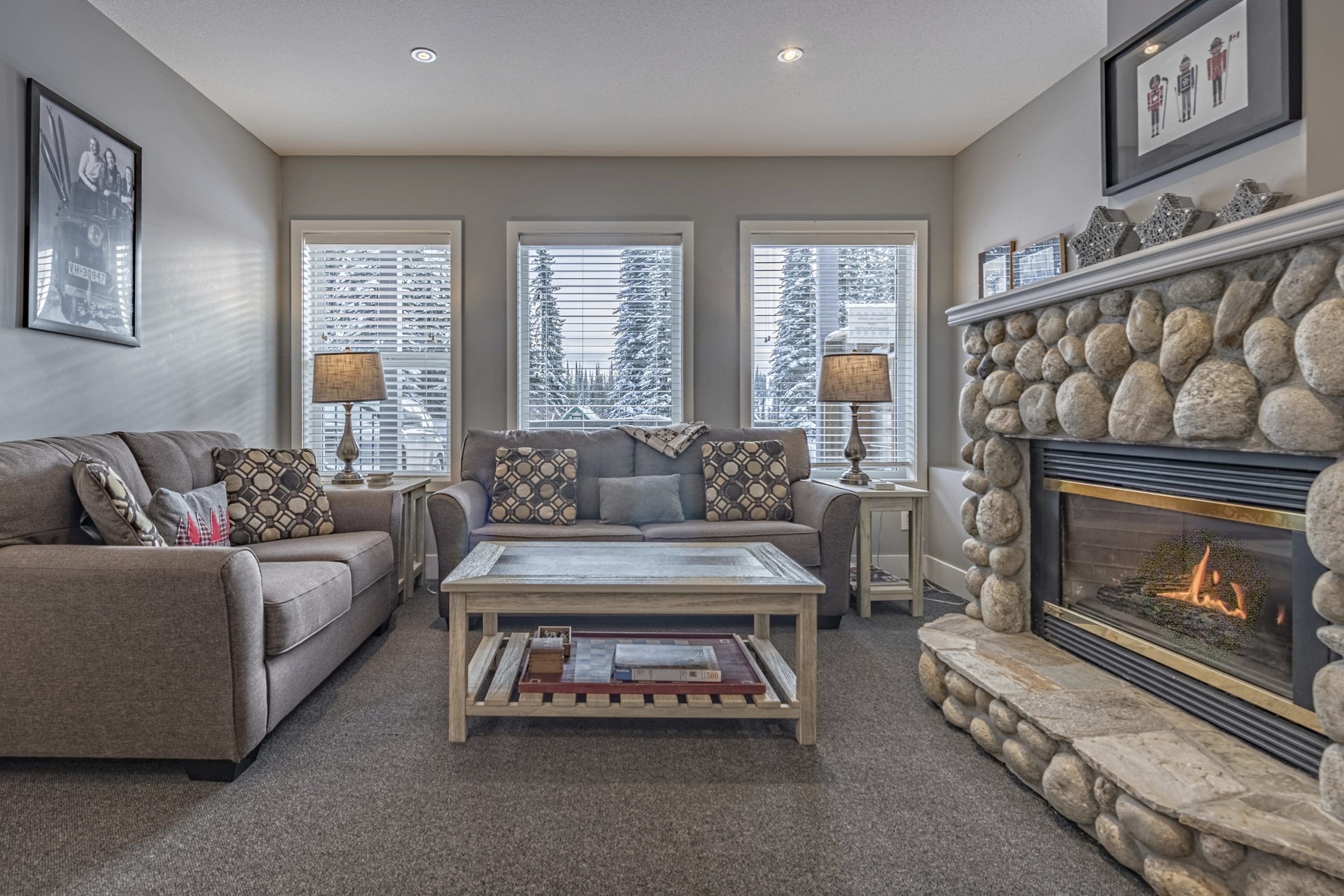 Abbott Suite Living Room. Beautiful mountain views of the Alpine Meadows Chairlift, private hot tub, gas fireplace and it's pet-friendly!